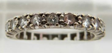 A 9ct gold eternity ring set with synthetic spinel, 2.7g, size K