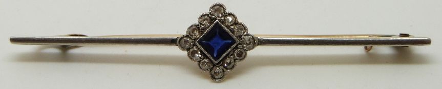 Art Deco brooch set with a square cut sapphire surrounded by diamonds, 6.2cm long