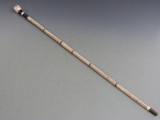 Shark vertebrae walking stick with skull knop, length 95cm