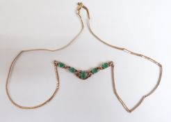 A 9ct gold necklace set with emeralds and diamonds, 4.2g
