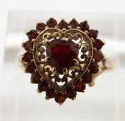 A 9ct gold ring set with garnets in a heart shape, 2.7g, size P