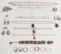 A collection of silver jewellery including a large curb link necklace, 9ct gold and silver ring,