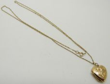 A 9ct gold heart locket and chain, 2.3g