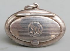 George V hallmarked silver miniature oval compact with mirror to interior of lid and engraved line