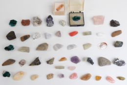 Forty-seven various rough gemstones including rose quartz, amethyst etc.