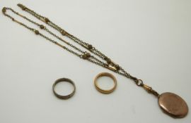 A 9ct gold ring 3.6g, a 9ct and silver ring and a Victorian locket
