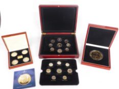 Three deluxe cased coin sets comprising, predecimal and decimal emblems of Queen Elizabeth II,