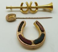 9ct gold brooch in the form of a horn and horseshoes, a horseshoe pin and another brooch, 5.1g