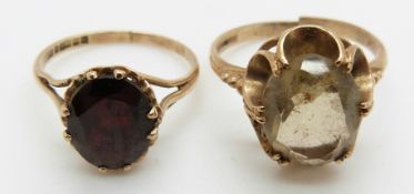 Two 9ct gold rings, one set with an oval cut garnet and another set with citrine, 5g