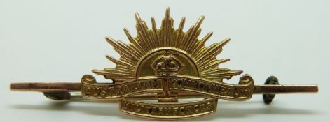 A 9ct gold Australian Commonwealth Military Forces bar brooch in original box, property of