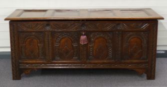 Antique oak carved and panelled coffer with peg joints, W166 x D65 x H68cm