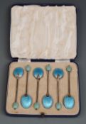 Cased set of six Art Deco blue enamel backed hallmarked silver spoons, Birmingham 1937 maker