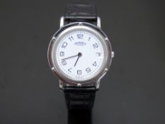 Hermes Clipper stainless steel gentleman's wristwatch with date aperture, black hands and Arabic