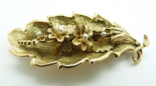 Victorian brooch/ pendant set with seed pearls in a textured floral and leaf design, 4.8g, 5 x 2cm