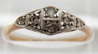 A 9ct gold ring set with diamonds in a platinum setting, 1.8g, size O