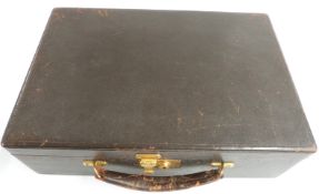 A tooled leather travelling jewellery case by Black, Starr & Gorham and bank cloth bags