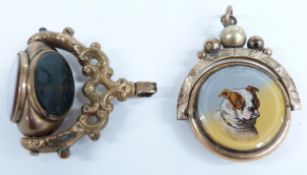 Two Victorian swivel fobs set with agate and one depicting a dog