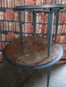 Industrial/haberdashery/shopfitting two circular steel tables, one inset with parquet tiles, largest