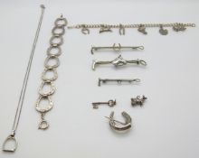 A collection of equestrian themed silver jewellery including bracelet made up of horseshoe links,