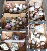 A large collection of mineral samples and geodes including gypsum, agate, quartz, sodalite,