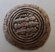 A hammered silver eastern coin
