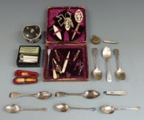 Eight hallmarked silver teaspoons, weight 157g, two folding mother-of-pearl and hallmarked silver