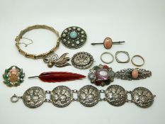 A hallmarked silver bamboo bangle, silver leaf brooch set with red enamel, silver and enamel