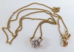 A 14k gold necklace set with a cubic zirconia, 18cm drop, 2.2g all in
