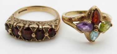 A 9ct gold ring set with garnets and diamonds and a 9ct gold ring set with blue topaz, garnet,