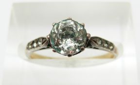 A 9ct gold and silver ring set with paste, 1.8g, size K