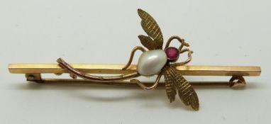 9ct gold brooch set with a pearl and a garnet in the form of a dragonfly
