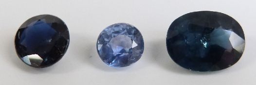 A round cut cournflower blue sapphire measuring approximately 0.3ct, on oval cut sapphire