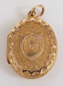 Victorian yellow metal locket with chased and buckle decoration, 3.7g, 2cm long