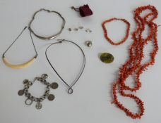 A silver necklace, two coral necklaces, silver bracelet, silver earrings etc