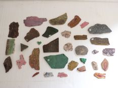 Thirty-two polished agate slices/ samples including malachite.