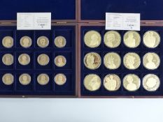 Two cased sets of gold plated commemorative coins comprising 12 x 50mm 