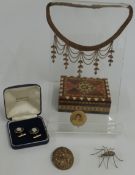 A silver spider brooch, white metal Eastern brooch, pair of Wedgwood cufflinks, and a filigree