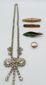 A 9ct gold brooch with applied floral decoration (1.8g), silver brooch, 9ct gold ring and a diamante