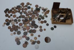 Collection of items including slide rule, protractor, scale, coins etc