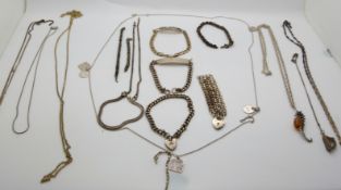 A collection of silver jewellery including bracelets, chains and necklaces
