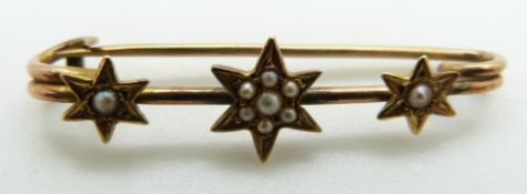 Edwardian gold brooch set with seed pearls in star settings, 1.6g, 3.3cm