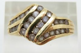 A 14ct gold ring set with amethysts, 5g, size T