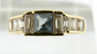 An 18ct gold ring set with paste, 2.58g, size O