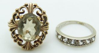 A 14k white gold ring, 2.3g, size L and a 9ct gold ring set with smoky quartz, 4.3g, size J