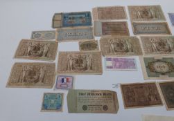 A collection of sundry UK and overseas coinage and banknotes etc together with two one troy ounce