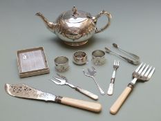 Three hallmarked silver napkin rings and a collection of silver plated ware including teapot,