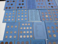 A large amateur collection of UK and overseas coinage, some in Whitman folders, modern crowns, 10