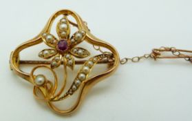 Art Nouveau 15ct gold brooch set with a ruby and seed pearls, 3.55g