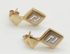 A pair of 14ct bi- coloured gold earrings in a Greek key design, 3.8g