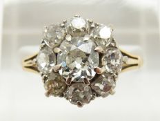 Victorian 18ct gold ring set with old cut diamonds in a cluster, the centre diamond approximately